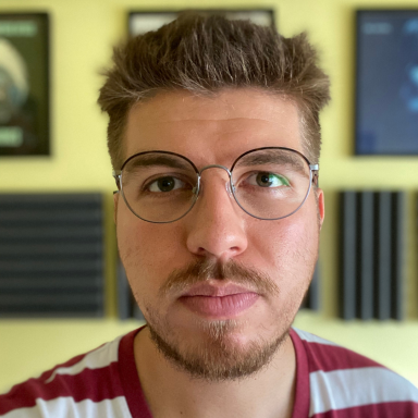 Selfie photo of Felipe Airey Franco. He is straight into the camera and wearing a red and white t shirt and wearing glasses.